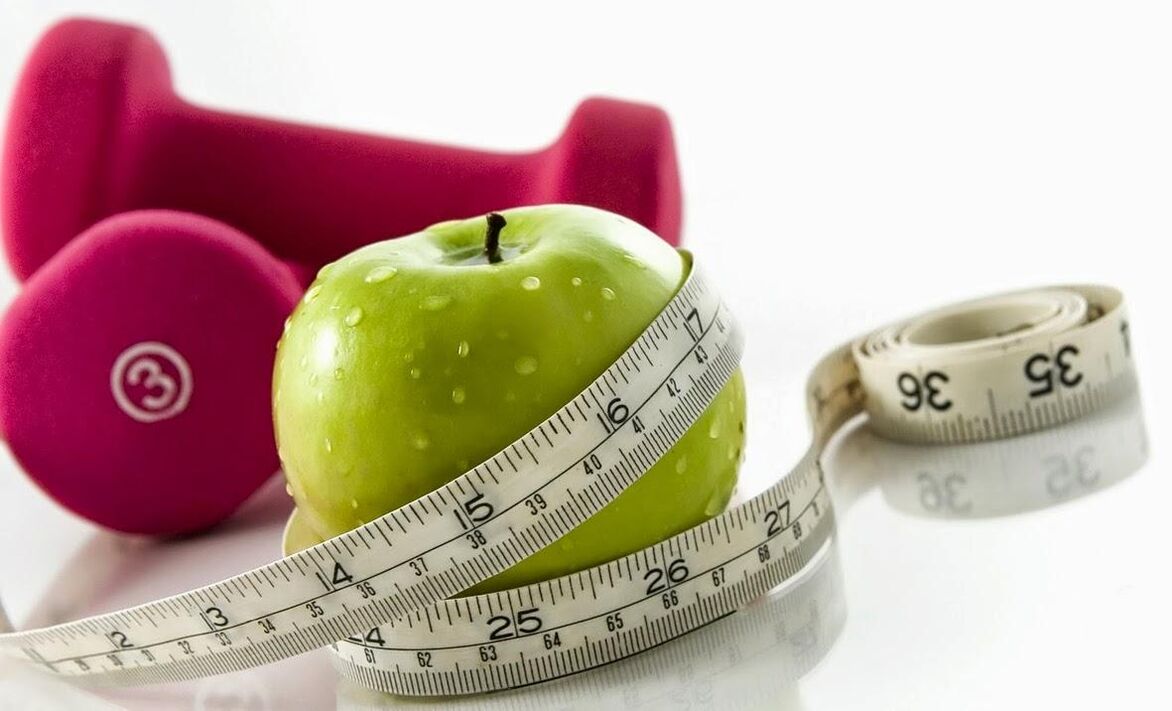 Mazá e pesas para reducir o peso en 10 kg ao mes
